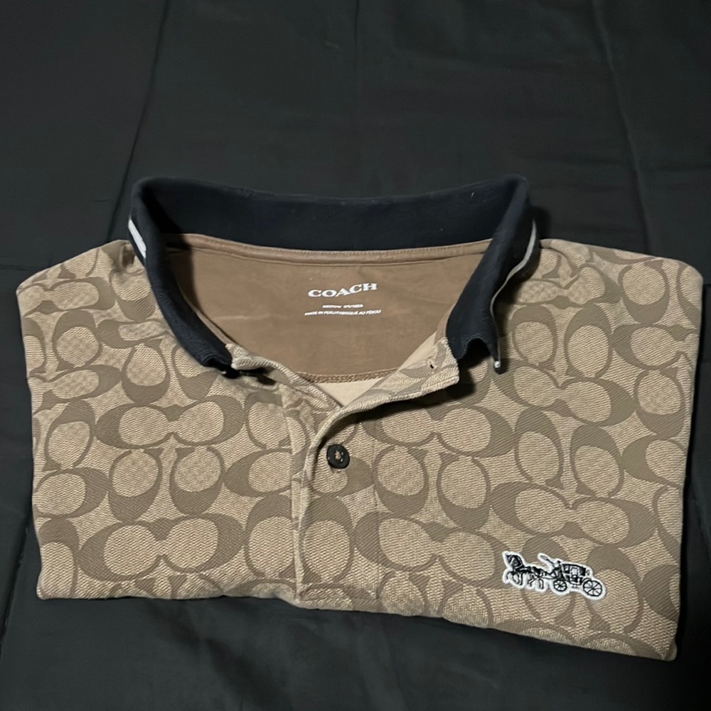 Coach polo shirt worn twice shirt is like new.
